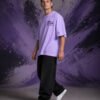 Never Give Up Tee (Oversized) side Never Give Up Tee (Oversized) side view worn by model