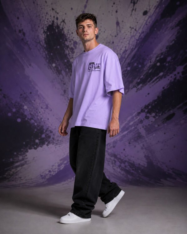 Never Give Up Tee (Oversized) side Never Give Up Tee (Oversized) side view worn by model