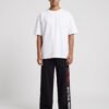 Red Bull Racing RB20 Baggy Jogger (Black) styled with a plain white oversized tee Red Bull Racing RB20 Baggy Jogger (Black) styled with a plain white oversized tee