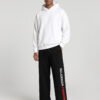 Scuderia Ferrari Baggy Jogger (Black) styled with a plain white oversized hoodie