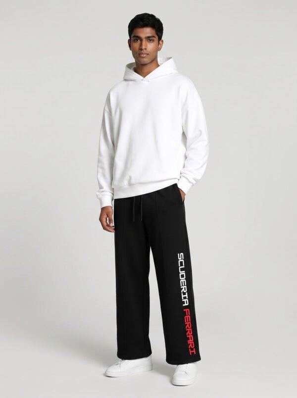 Scuderia Ferrari Baggy Jogger (Black) styled with a plain white oversized hoodie