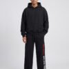 Red Bull Racing RB20 Baggy Jogger (Black) styled with a plain black oversized hoodie Red Bull Racing RB20 Baggy Jogger (Black) styled with a plain black oversized hoodie