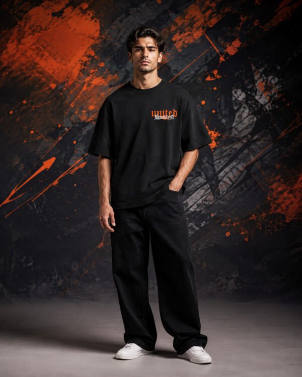 United Brooklyn Graphic T-Shirt BLACK (OVERSIZED) front United Brooklyn Graphic T-Shirt BLACK (OVERSIZED) front view worn by model