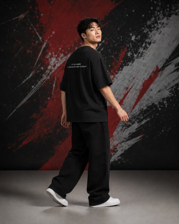 Karma Quote Graphic T-Shirt (Oversized) side Karma Quote Graphic T-Shirt (Oversized) side view worn by model