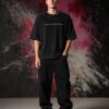 Love and Smoking Quote Graphic T-Shirt (Oversized) front Love and Smoking Quote Graphic T-Shirt (Oversized) front view worn by model